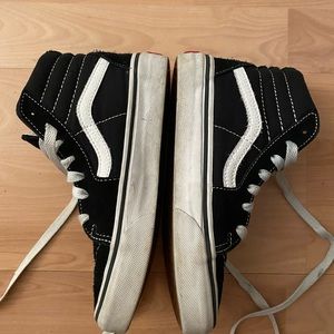 Hi top black and white vans